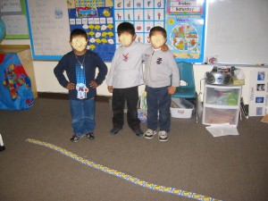 Sequencing the numbers from 1-30 using calendar cut outs.